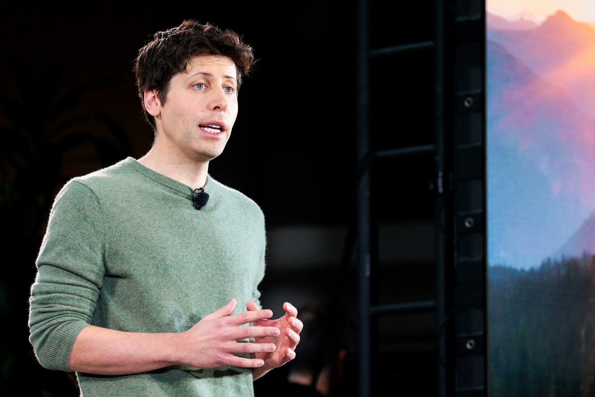 Sam Altman giving a presentation about innovation